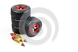 Shock-absorbers and wheels