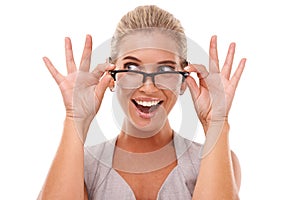 Shock, excited and portrait of a woman with spectacles in a studio with a omg, wow or wtf facial expression. Shocked