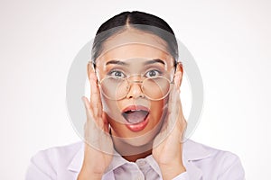 Shock, glasses and portrait of businesswoman in a studio with wow, omg or wtf facial expression. Surprise, optometry and