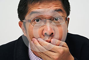Shocked asian businessman photo