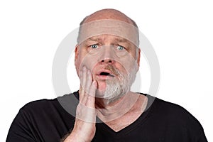 Shocked Bearded Man with Half Shaved Beard in Black T-Shirt, Surprised Expression, Facial Hair Transformation Concept on White photo