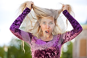 Shocked blond fashion model