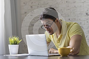 Shocked businessman with bugged eyes after bad news