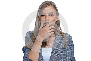 Shocked businesswoman covering mouth with hand