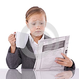 Shocked child, reading newspaper or studio with confused for business, coffee or surprise by daily headlines. Little