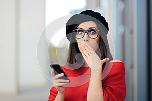 Surprised Fashion Woman Reading a Text Message photo