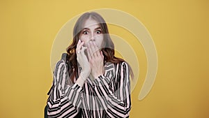 Shocked Girl Talking On Phone, Covered Mouth With Her Hand. Concept Of Bad News