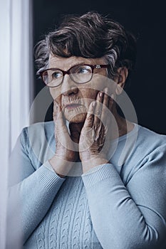 Shocked grandmother with Alzheimer`s disease