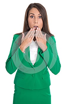 Shocked isolated business woman in green dress.