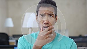 Shocked by Loss Black Young Man in Office, Portrait