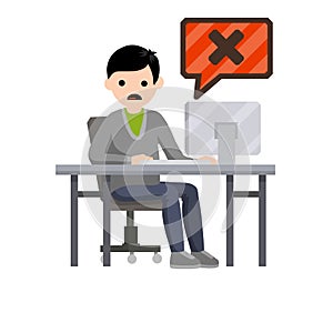 Shocked man is sitting at table with monitor.