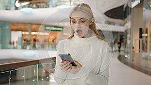 Shocked surprised Caucasian woman lady client customer gen z user read social media gadget addict happy girl win amazing