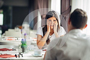 Shocked woman in disbelief handling bad news.Stressed crying female hearing about financial problems.Bankruptcy.Loosing property