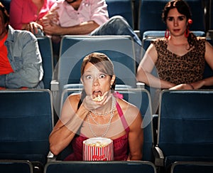 Shocked Woman Eats Popcorn