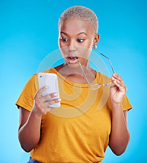 Shocked, wow and woman reading phone for fake news, wrong email and mistake or scam email. Surprise, stress and african