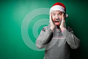 Shocked young man feeling excited