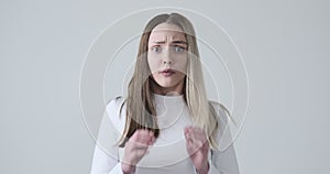 Shocked young woman feeling scared