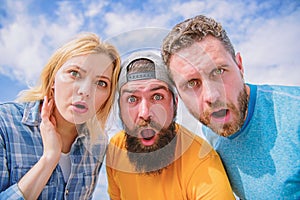 Shocking news. Amazed surprised face expression. How to impress people. Shocking impression. Men with beard and woman photo