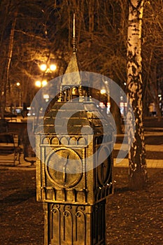 Shod clock tower in the night park