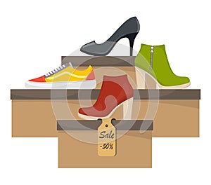 Shoe boxes with woman s footwear. Stylish modern sneakers, woman s high heel shoes on box, side view. The price tag with discount