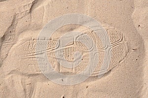 Shoe foot print on sand