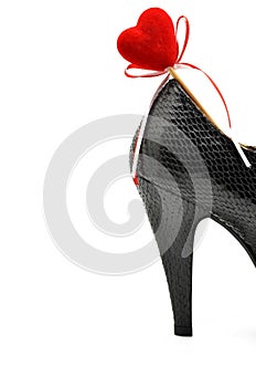 Shoe with heart ornament