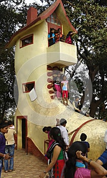 Shoe House where children  are playing