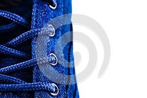 Shoe laces. Lace-up casual or sports shoes close-up on a white background. Shoes background