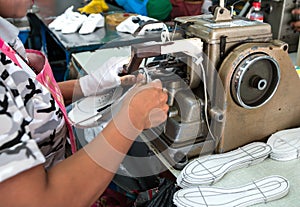 Shoe making process by sewing machine