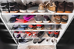 Shoe rack man sneakers photo