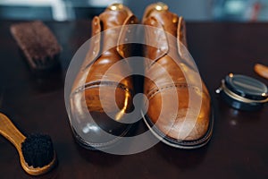 Shoe repair service concept, boots closeup