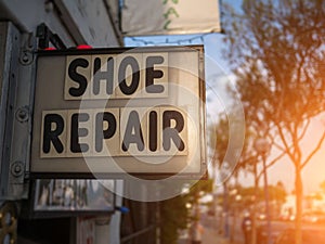 Shoe repair sign