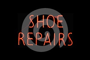 Shoe repairs neon sign photo