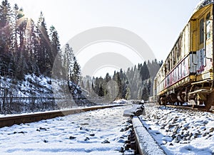 Shoe. Train. Rusty. Mountains. Snow. Winter. Forest