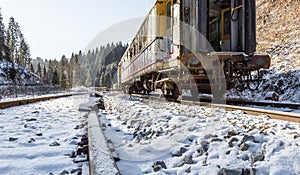 Shoe. Train. Rusty. Snow. Mountains. Winter. Forest