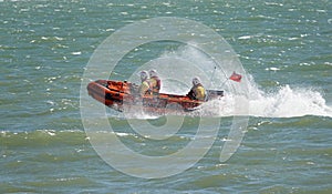 RNLI D class inshore lifeboat in action on the River Thames at Shoeburyness, Essex.