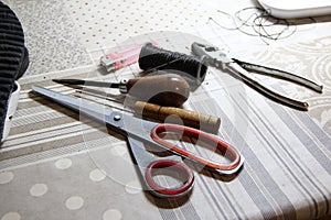 Shoemaker crafting tools set on a table
