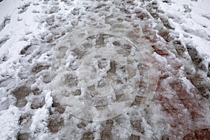 Shoeprints in melting snow - Athens, Greece, 15th of February 2021