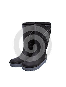 Shoes for bad weather. Warm rubber boots with tractor soles isolated on white back