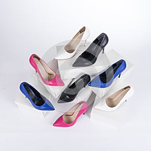 Shoes on boxes. women`s pointed heel stiletto shoes.