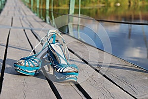 Shoes on a bridge