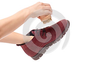 Shoes cleaning brush for shoes in hands