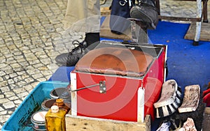 Shoes cleaning set on the street