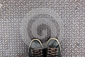 Shoes on diamond iron plate