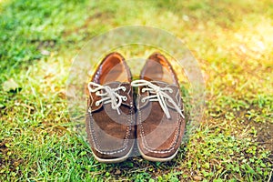 Shoes, elegant brown summer moccasins. Mens leather shoes, view from top, ready for catalog