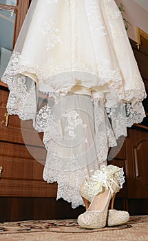 Shoes with garter and dress for bride