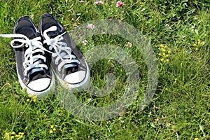 Shoes on green grass