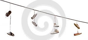 Shoes hanging by a thread