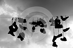 Shoes hanging on a wire