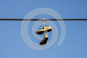 Shoes hanging from a wire in Bucharest